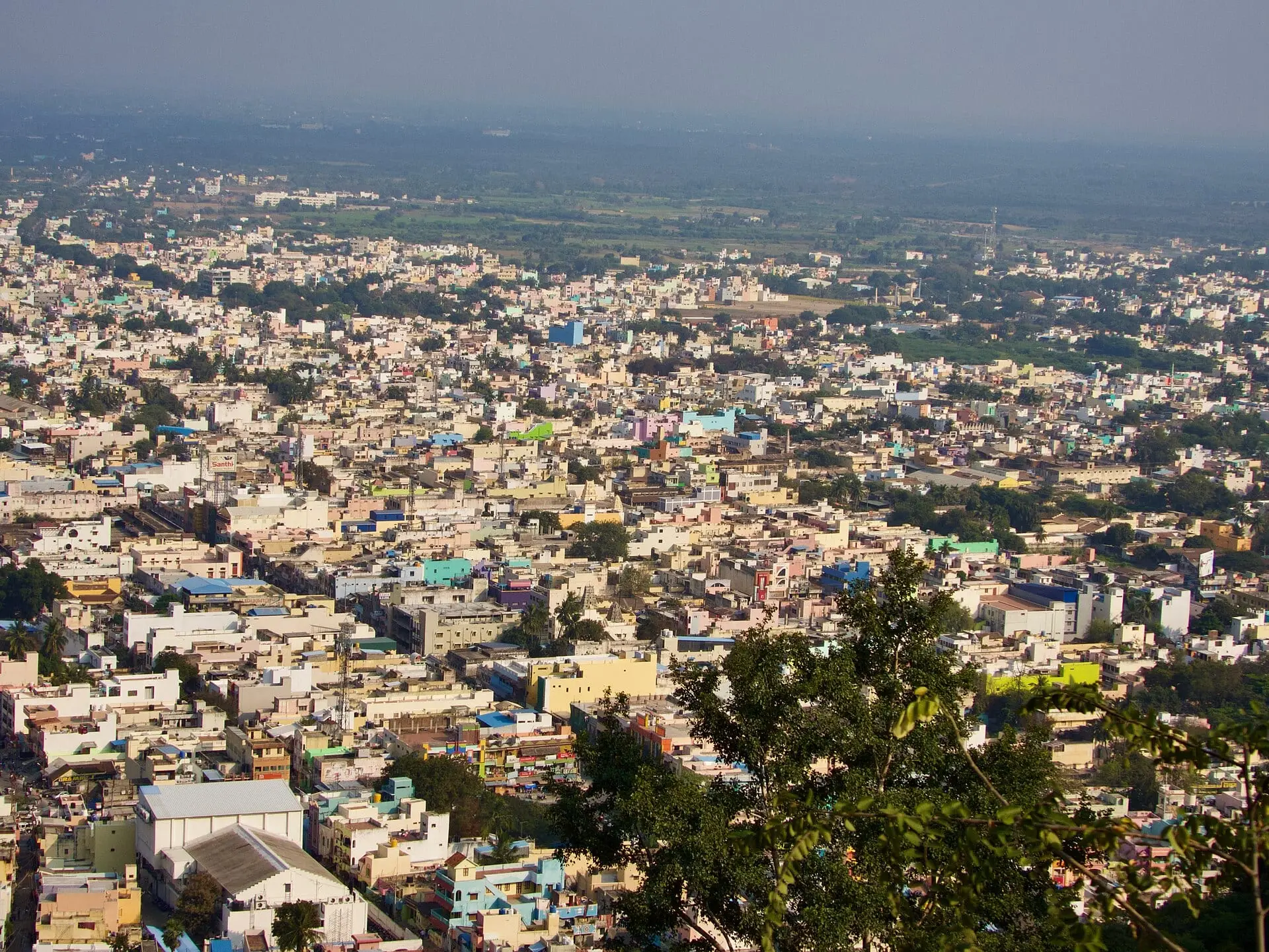 Tiruvannamalai town spreading across the plain, seen from the slopes of Arunachala